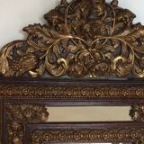 Mirror parecloses wood and metal pushed back