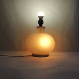 Vintage frosted glass lamp, round globe, elegant design, soft light.