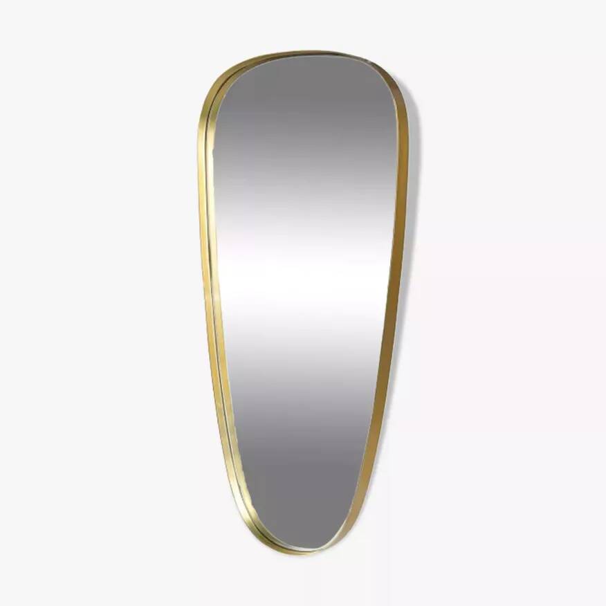 Rear view mirror and free form brass outline