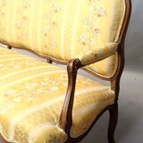 Natural wood canapé, moulded and carved, late 19th to early 20th century.