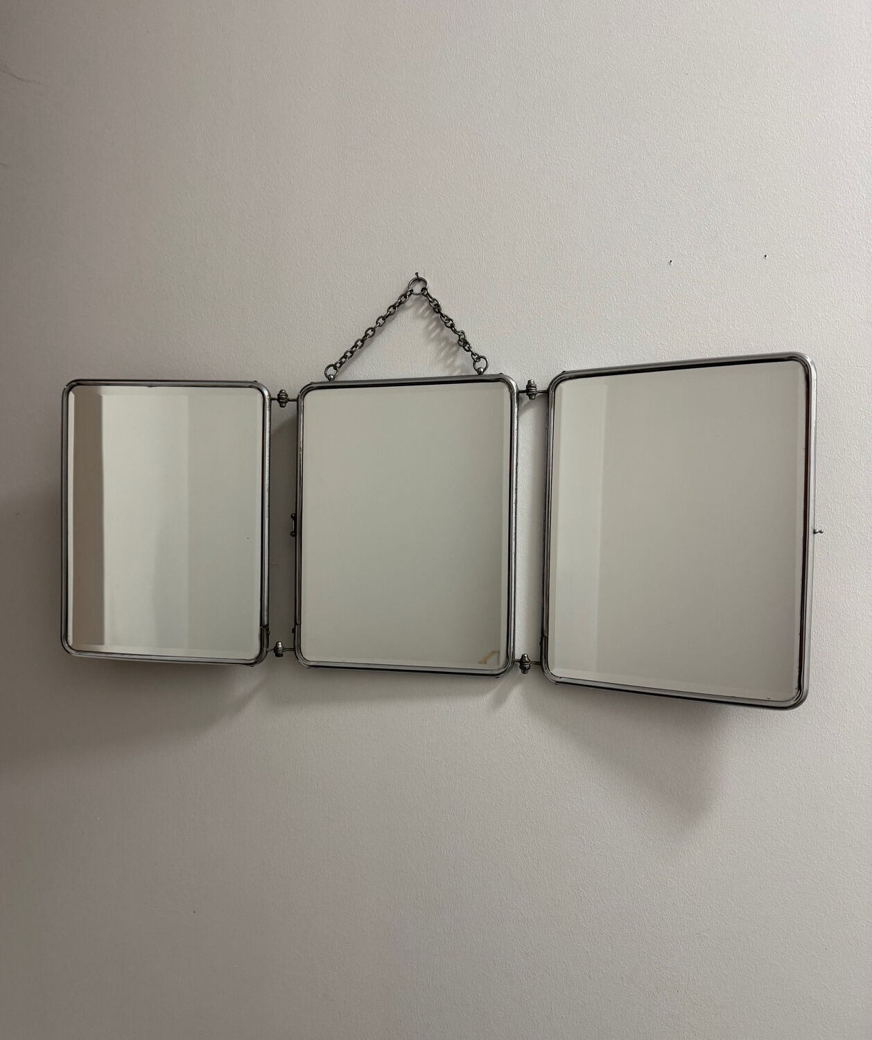 Bevelled triptych barber mirror from the 1950s.