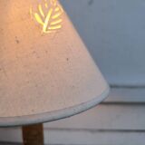 Table lamp in turned wood and rope