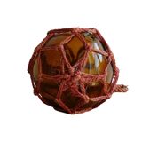 Flotteur de pêche vintage français en verre ambré