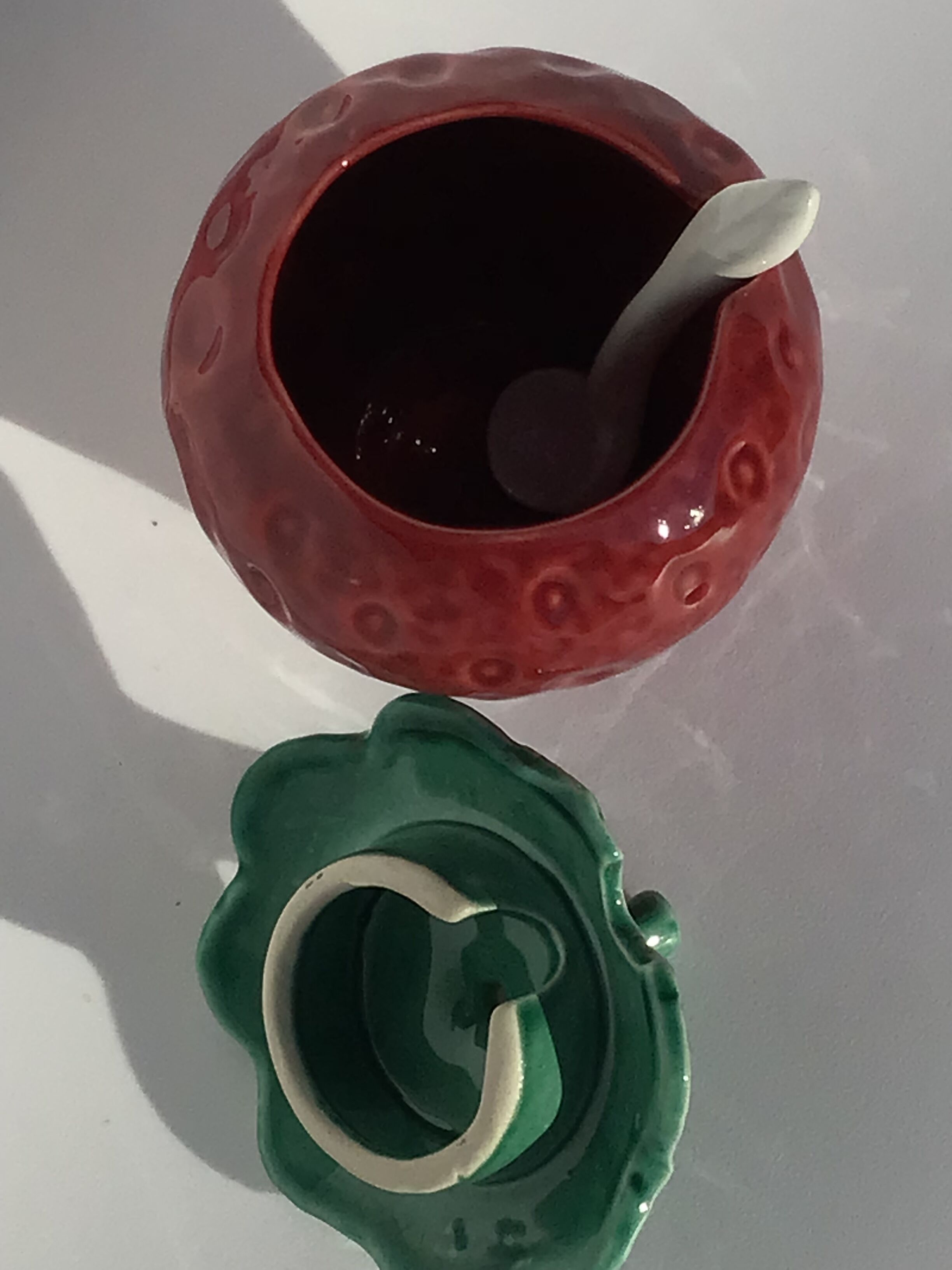 Slurry strawberry jam jar