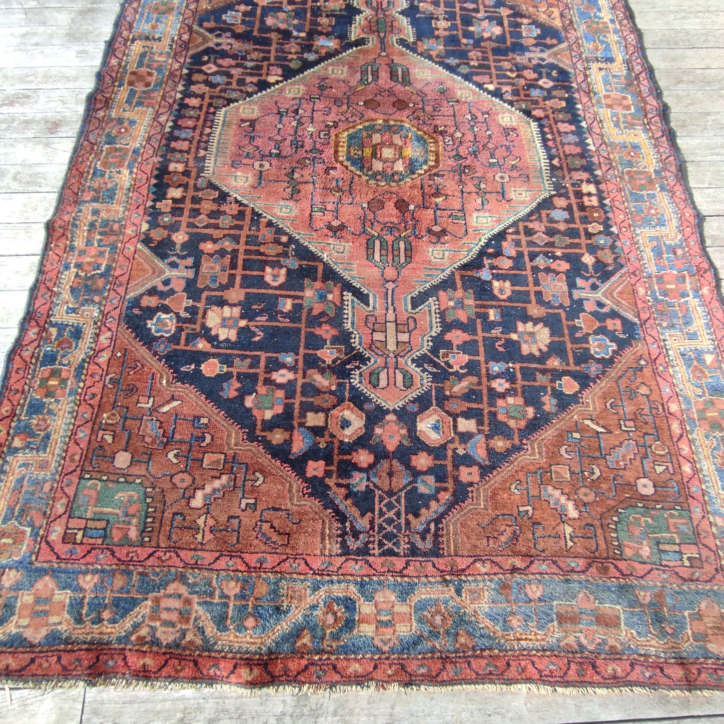 Old Persian carpet 1.62 m wide and 2.33 meters long