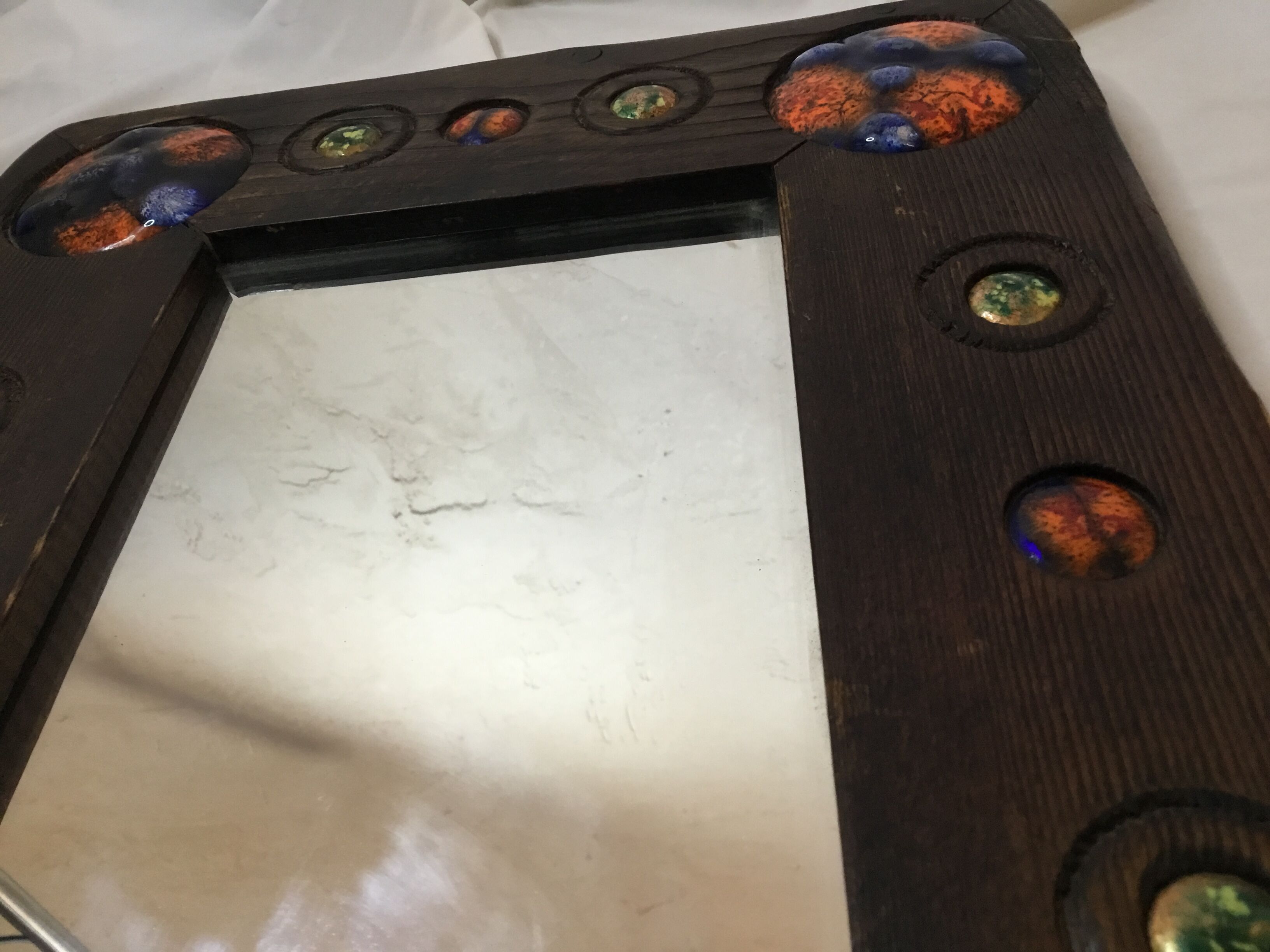 Wooden mirror with copper enamel decoration by Capo Esmaltes (Circa 1960)