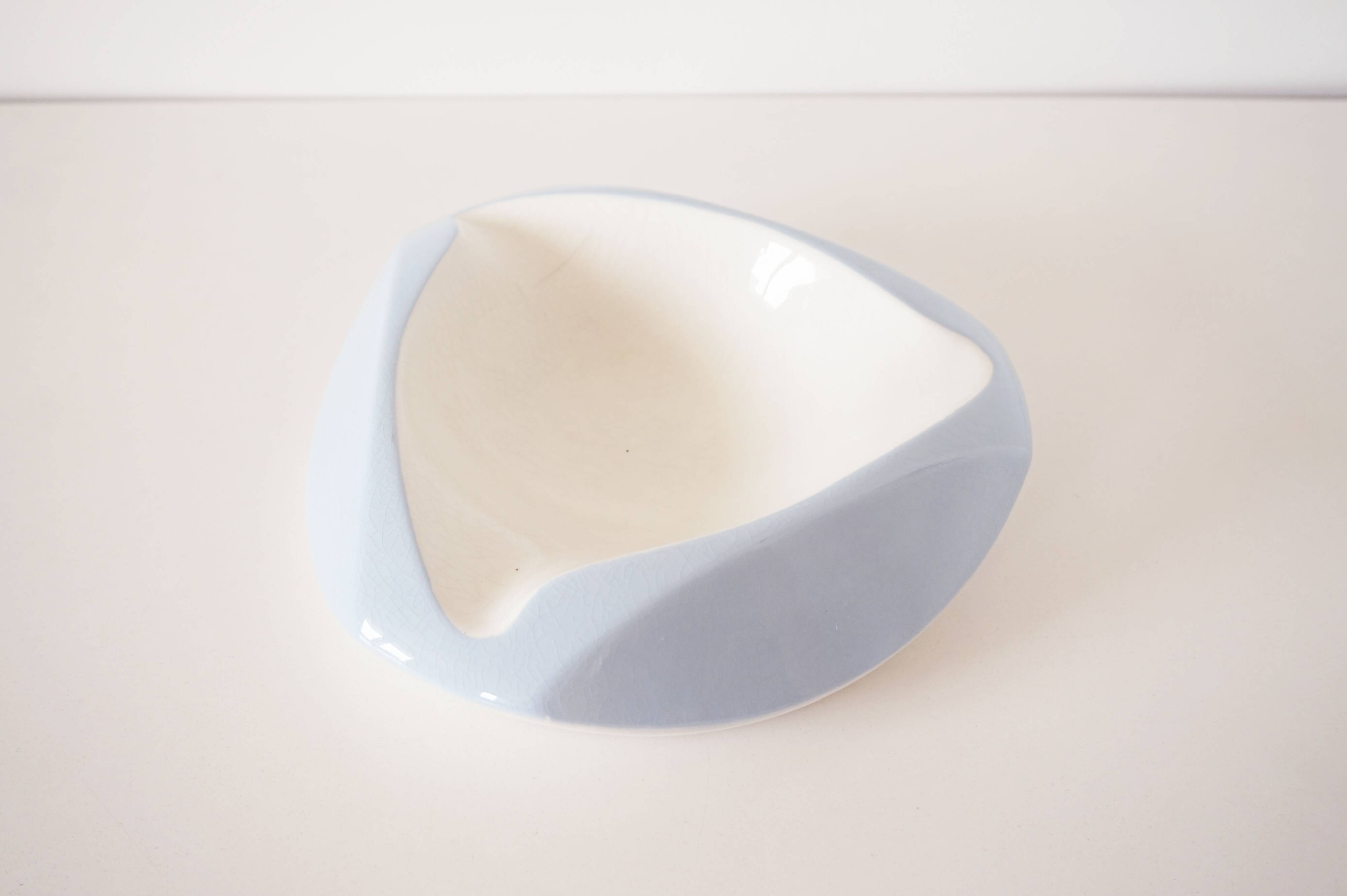 Large white and sky blue ceramic catchall from the 1950s.