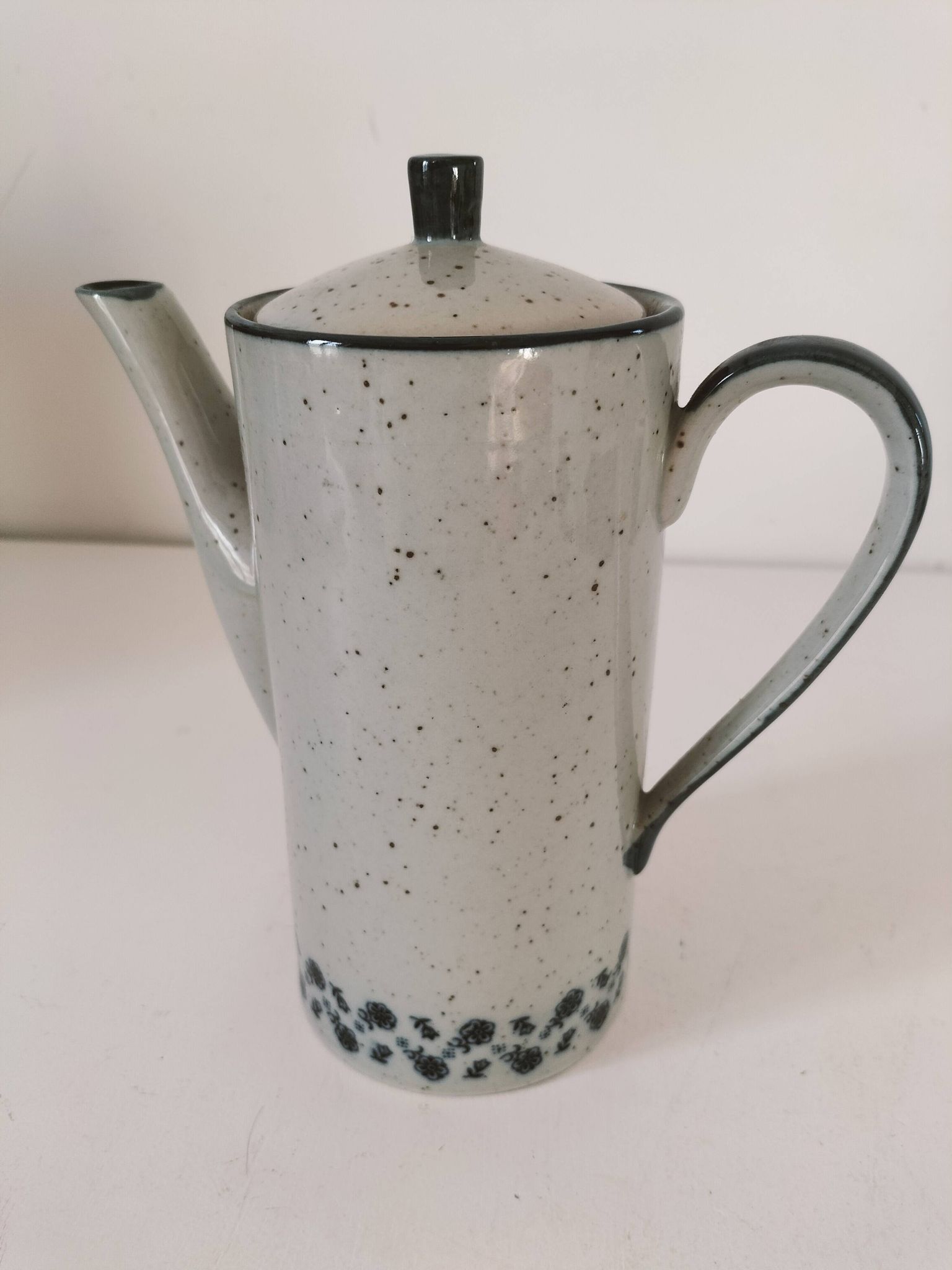 Vintage speckled stoneware coffee pot – navy blue floral decoration