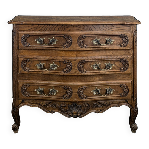 Commode néo rustique galbée richement sculptée
