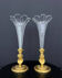 Pair of cut crystal and gilded bronze cornets, in Empire style.