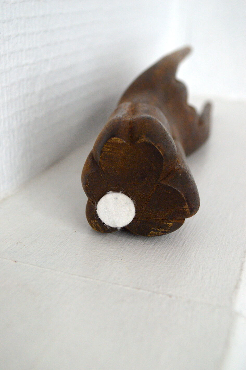 Carved wooden baguier hand