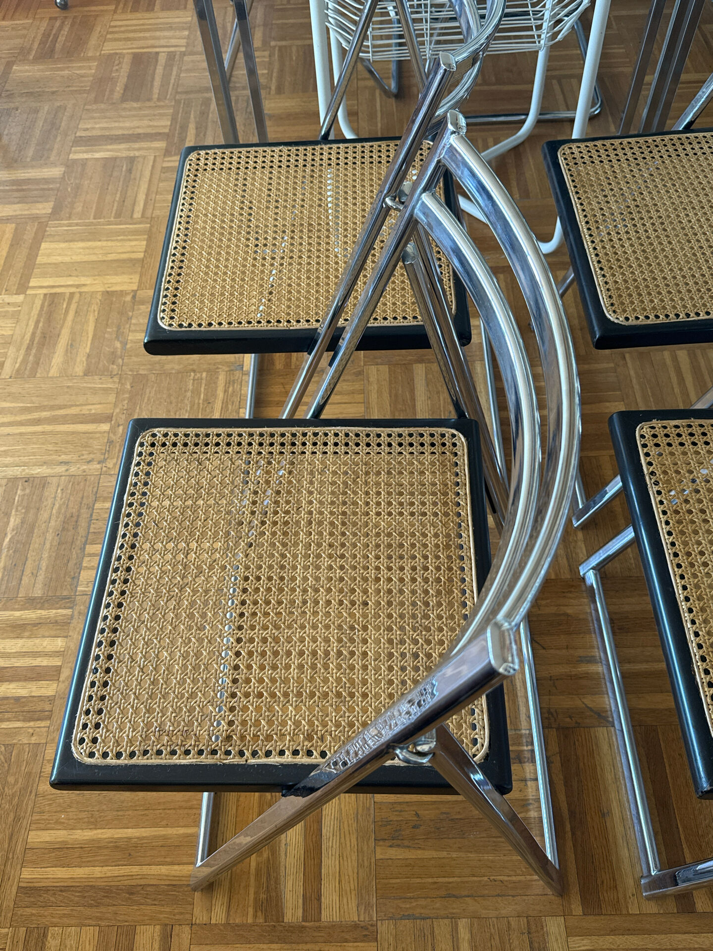 Set of 4 Italian folding chairs with caning.