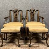 Pair of English armchairs with mahogany footrests circa 1850