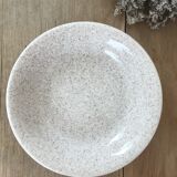 Beige speckled hollow plates