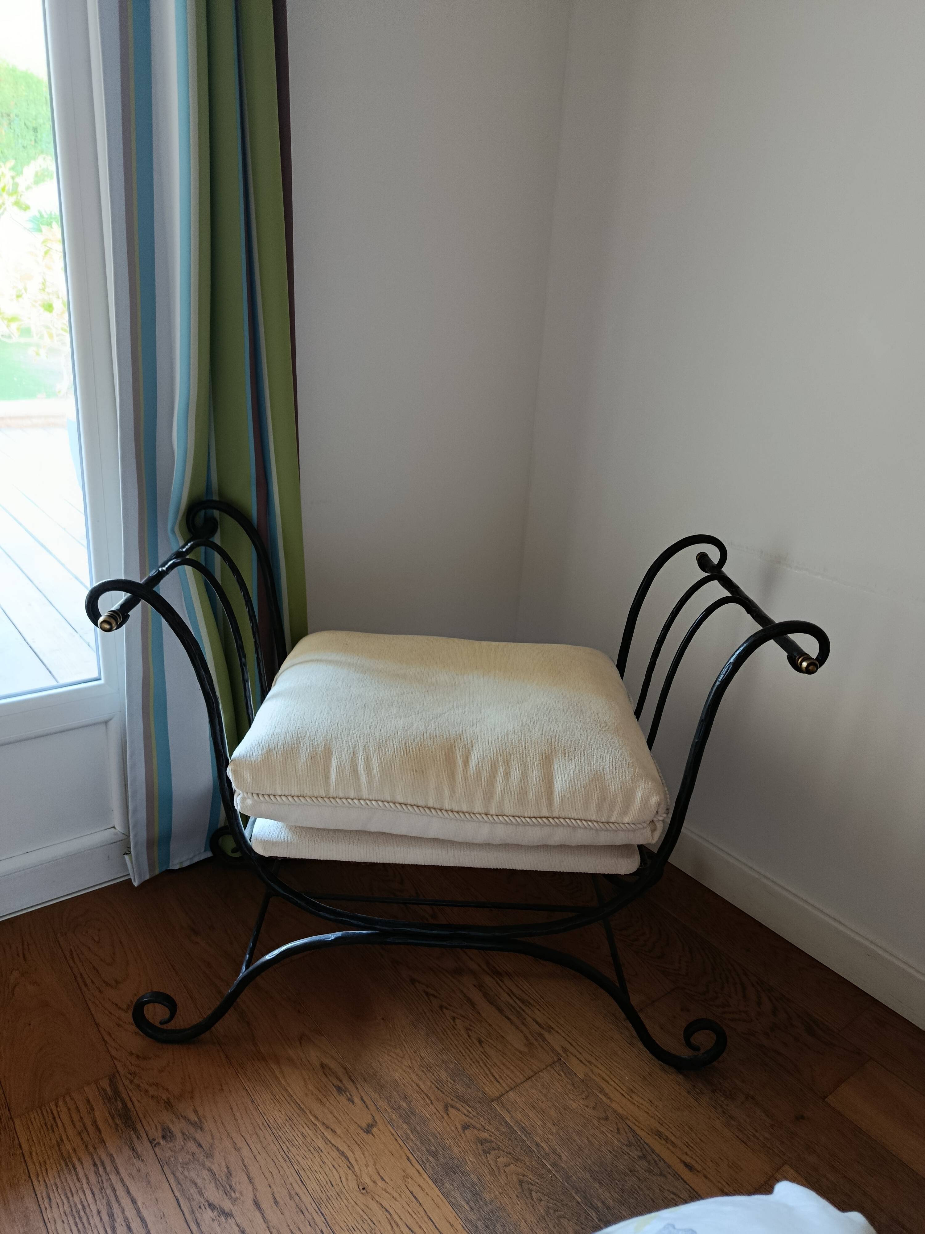 Artistic wrought iron pouf design