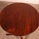 Small guéridon called tea table in mahogany from the early 19th century.
