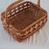 Old wicker basket with diamond-shaped decorations