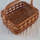 Old wicker basket with diamond-shaped decorations