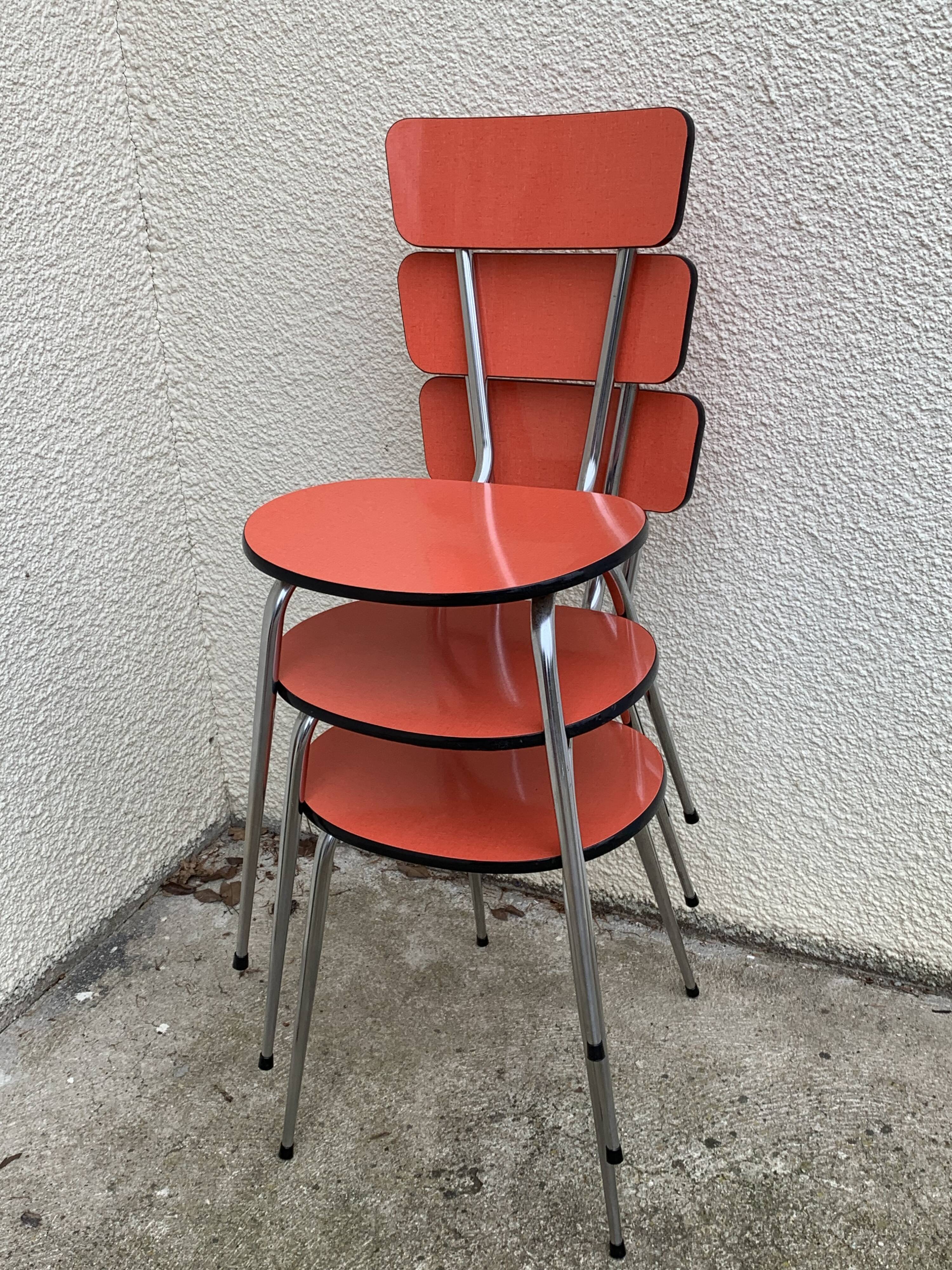 Red formica chairs 1950