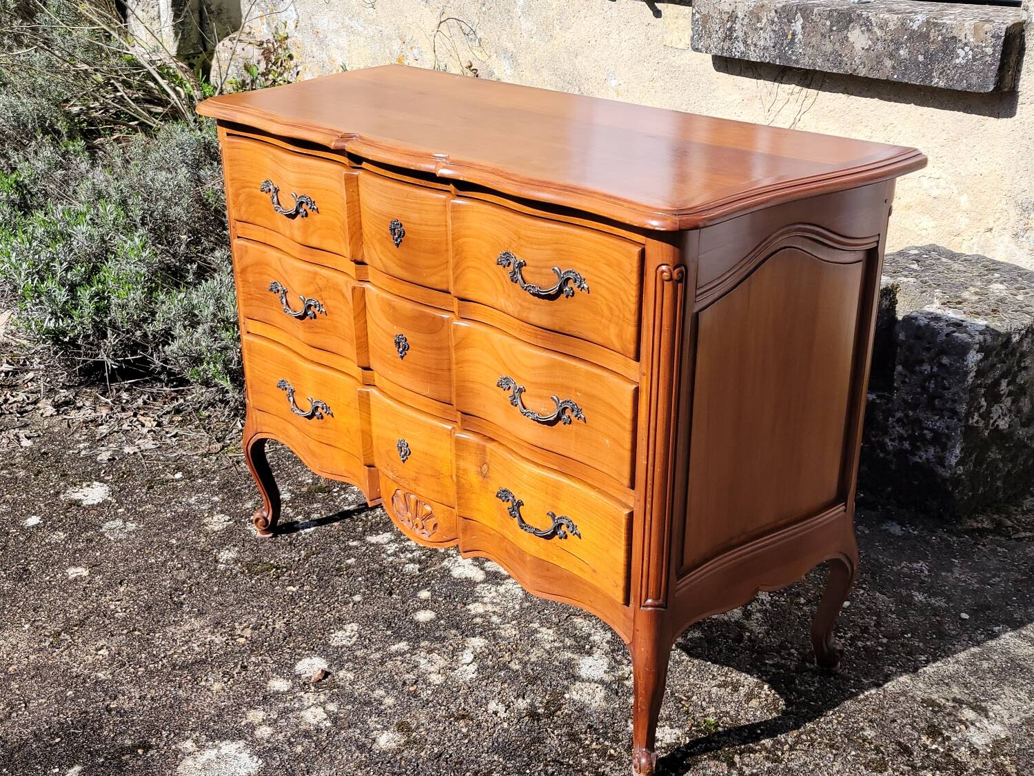 Louis XV style crossbow commode in cherry wood