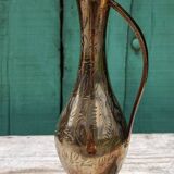 Carafe vase in chiseled brass