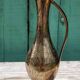 Carafe vase in chiseled brass
