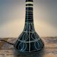 Vintage ceramic table lamp with electrified patterns to nine