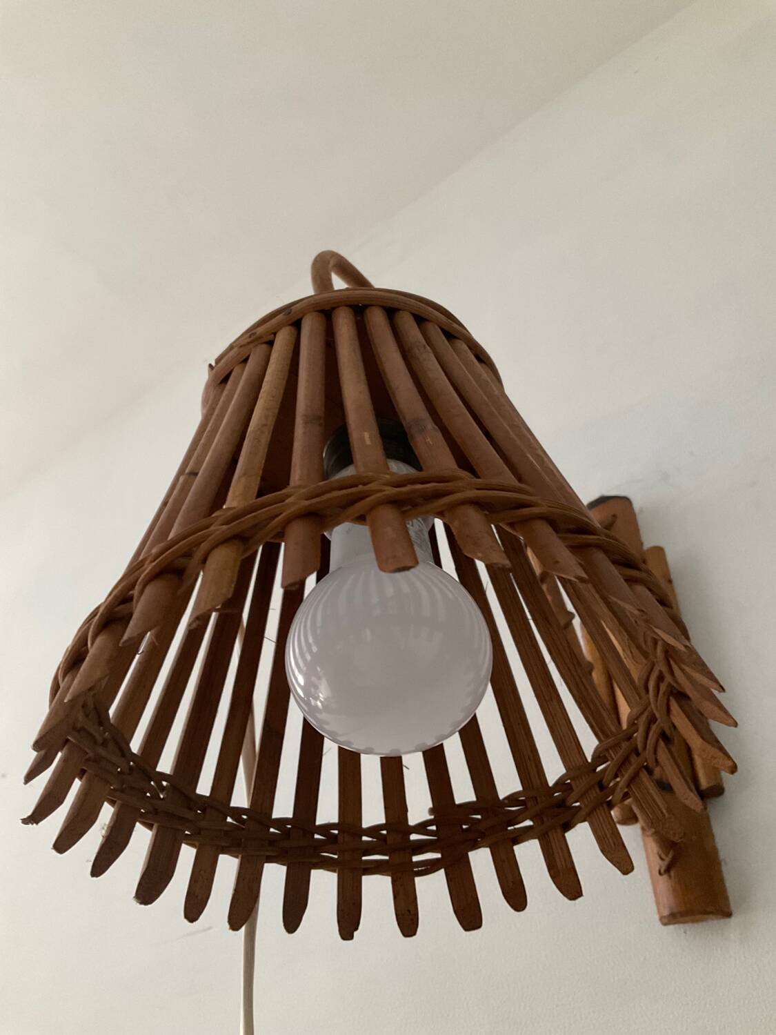 Louis Sognot rattan wall lamp from the 50s and 60s