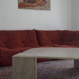 Vintage travertine coffee table, "Eye" model, by Rochebobois