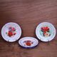 7 printed floral enamel plates "bon voyage" Made in China