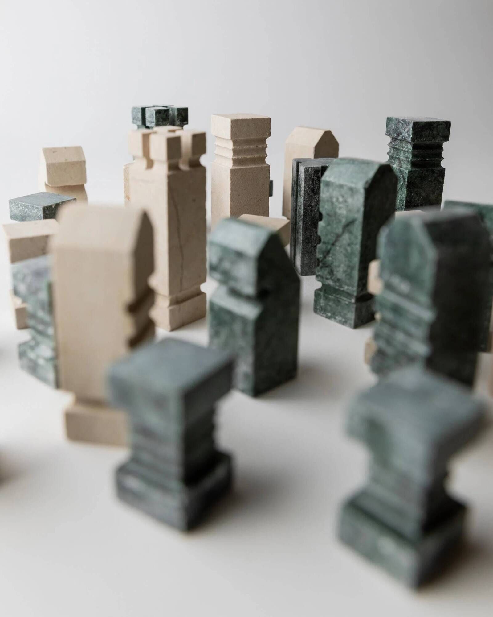 Vintage marble chess set from the 1970s, green and beige stone board, heavy design, geometric pieces, sculptural tabletop game, gift idea.