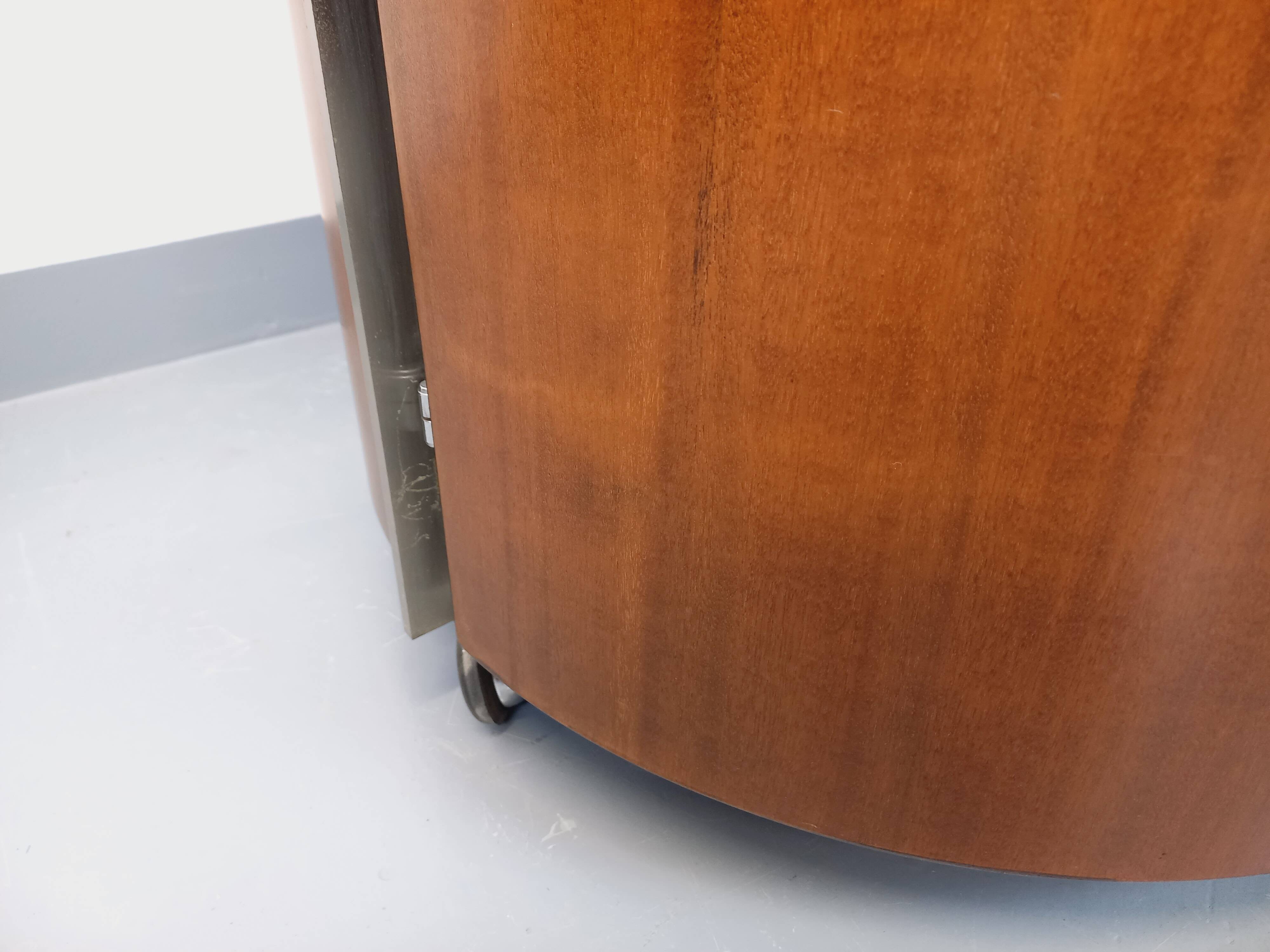 Round Italian teak coffee table swivel bar by Eugenio Gerli for Tecno