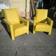 Pair of armchairs in sunny yellow leather