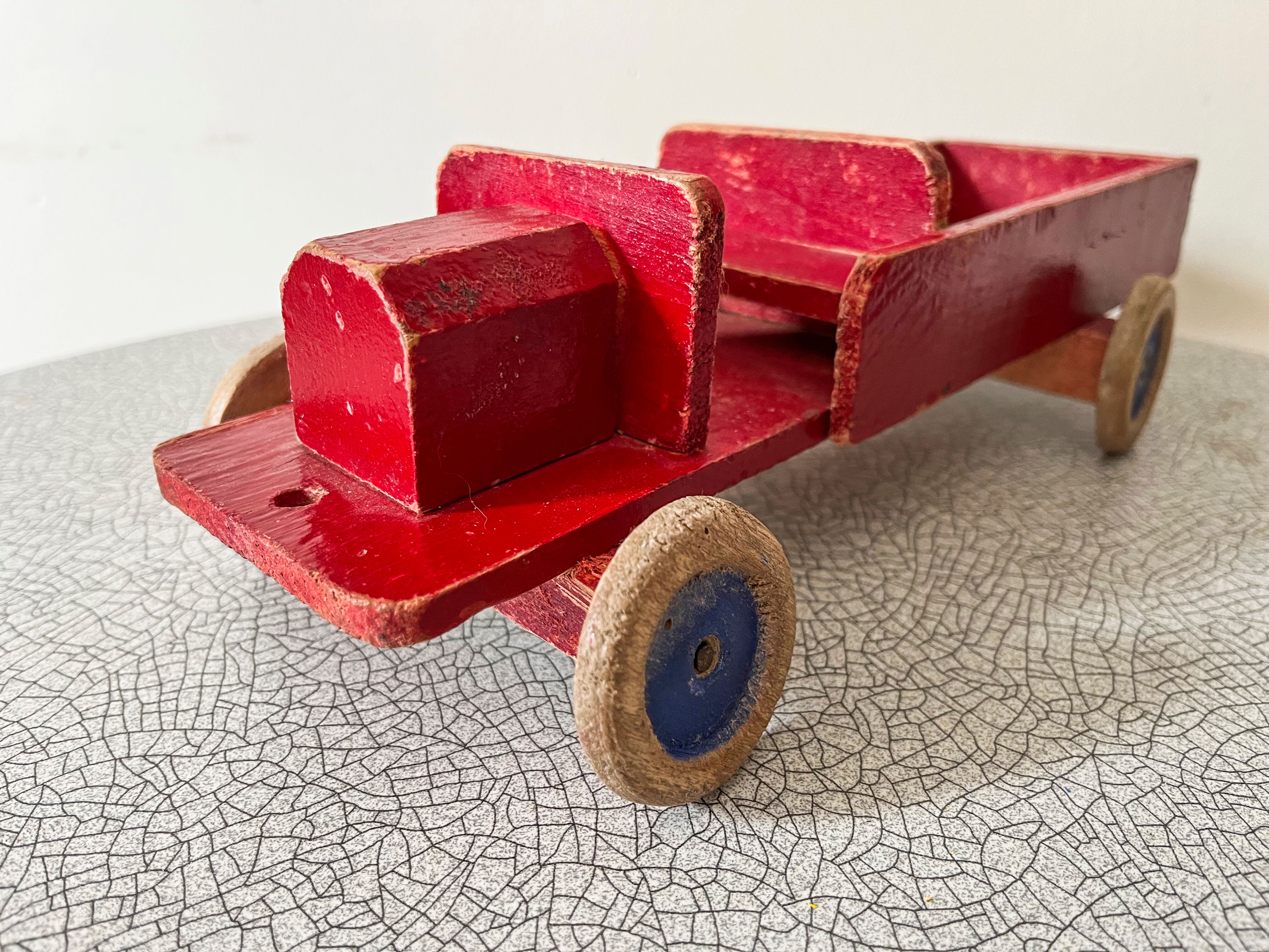 Red wooden flatbed truck. 1930s-40s