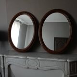 Pair of antique oval mirrors