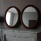 Paire de miroirs anciens ovales