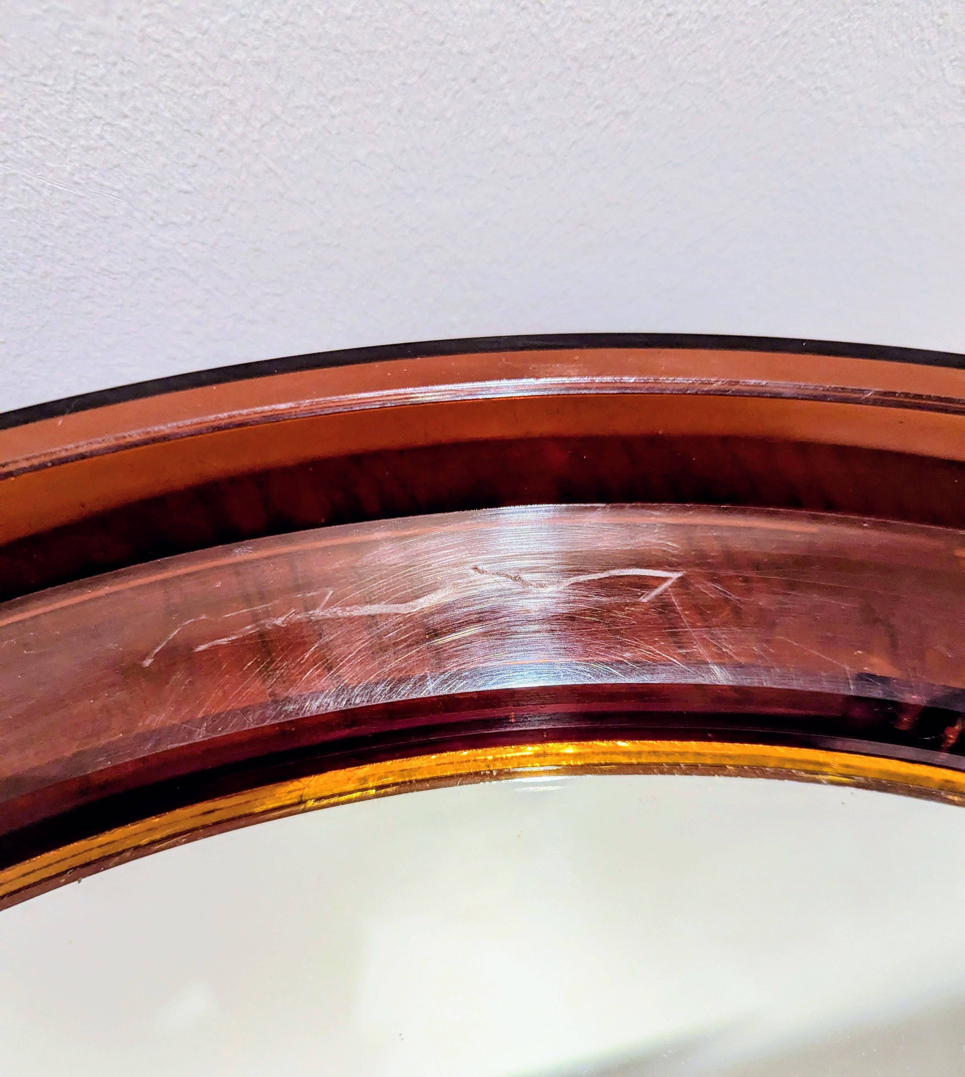 Vintage round orange plexiglass mirror Space Age 1970s