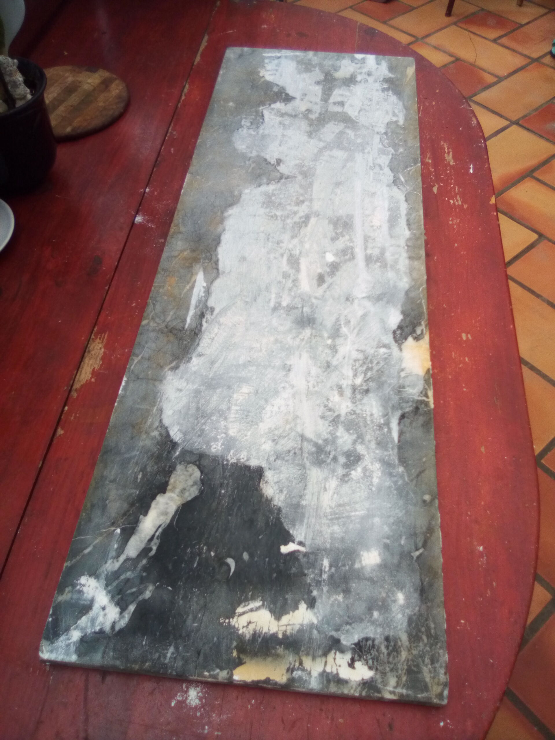 White veined black marble fireplace