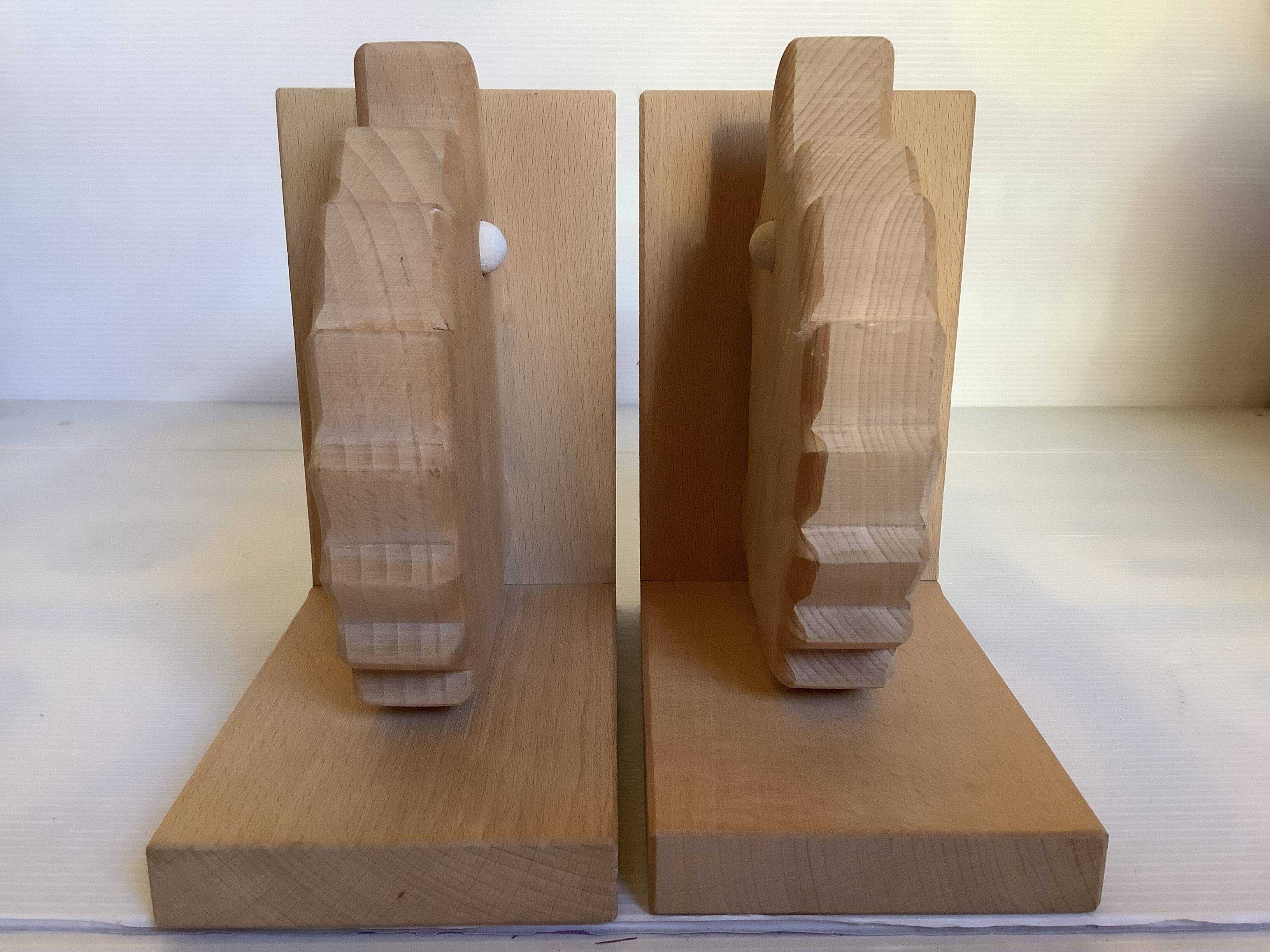 Pair of wooden hedgehog bookends
