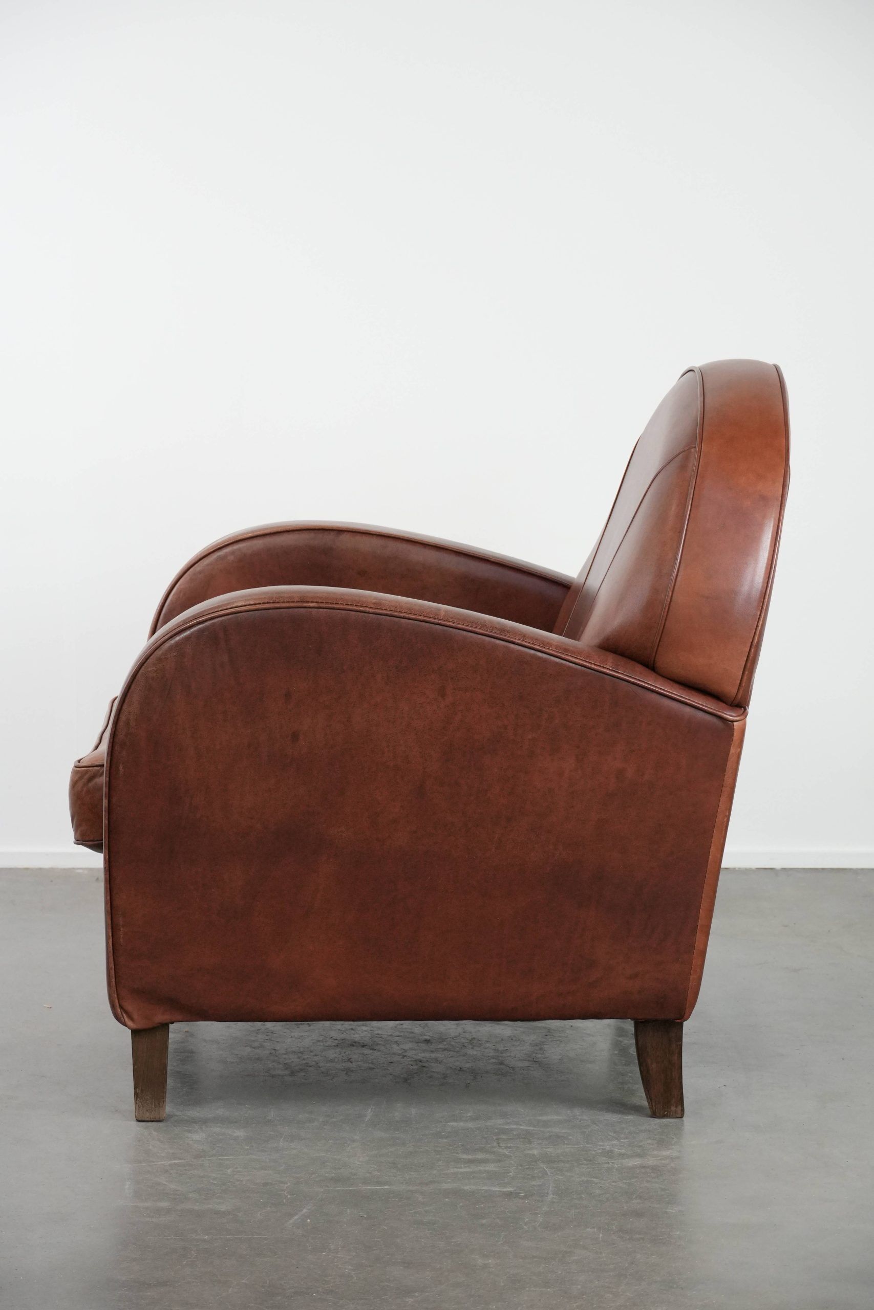 Beautiful art deco design armchair made of cowhide leather in English style