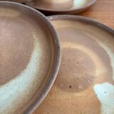 Lot of vintage 1970s beige stoneware dessert plates, handmade.