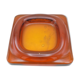 Empty-pocket in amber glass