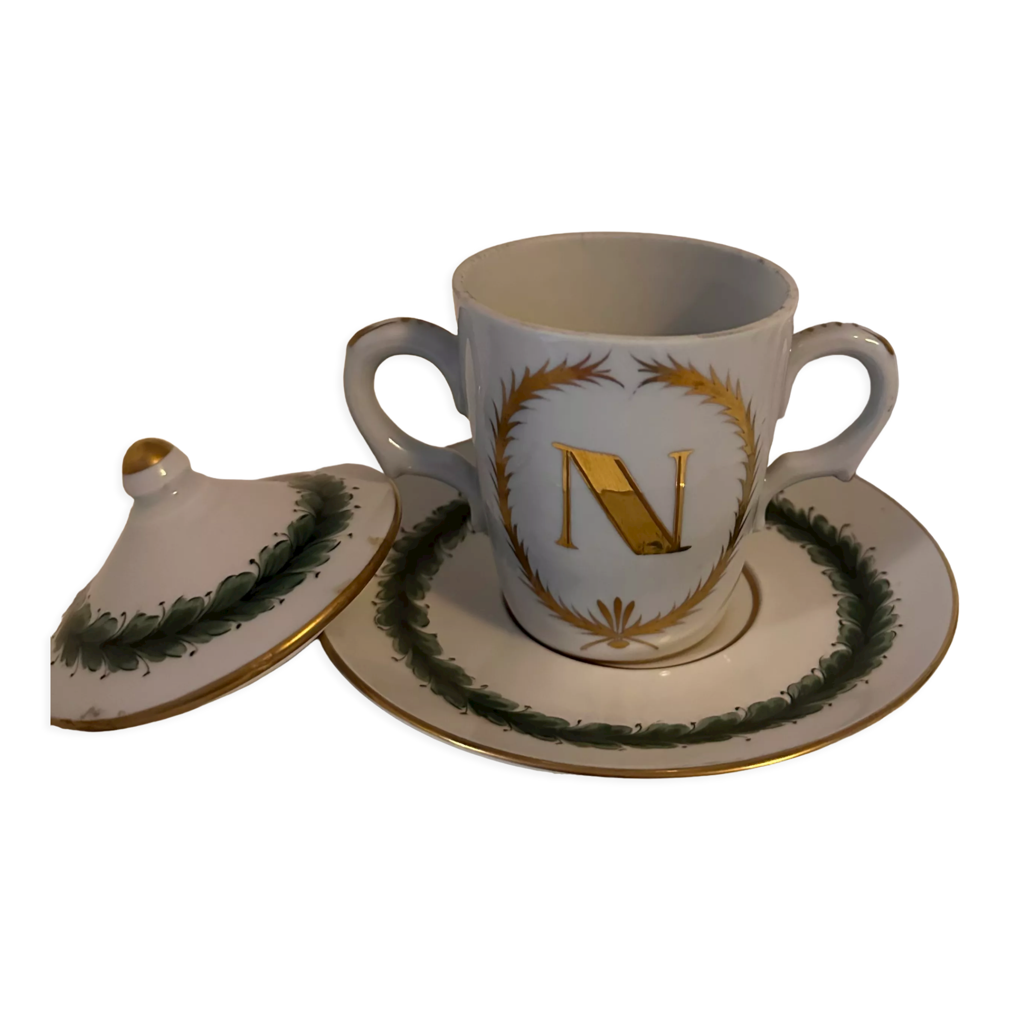 Porcelain cup of snake in the colors of Napoleon with its saucer and lid
