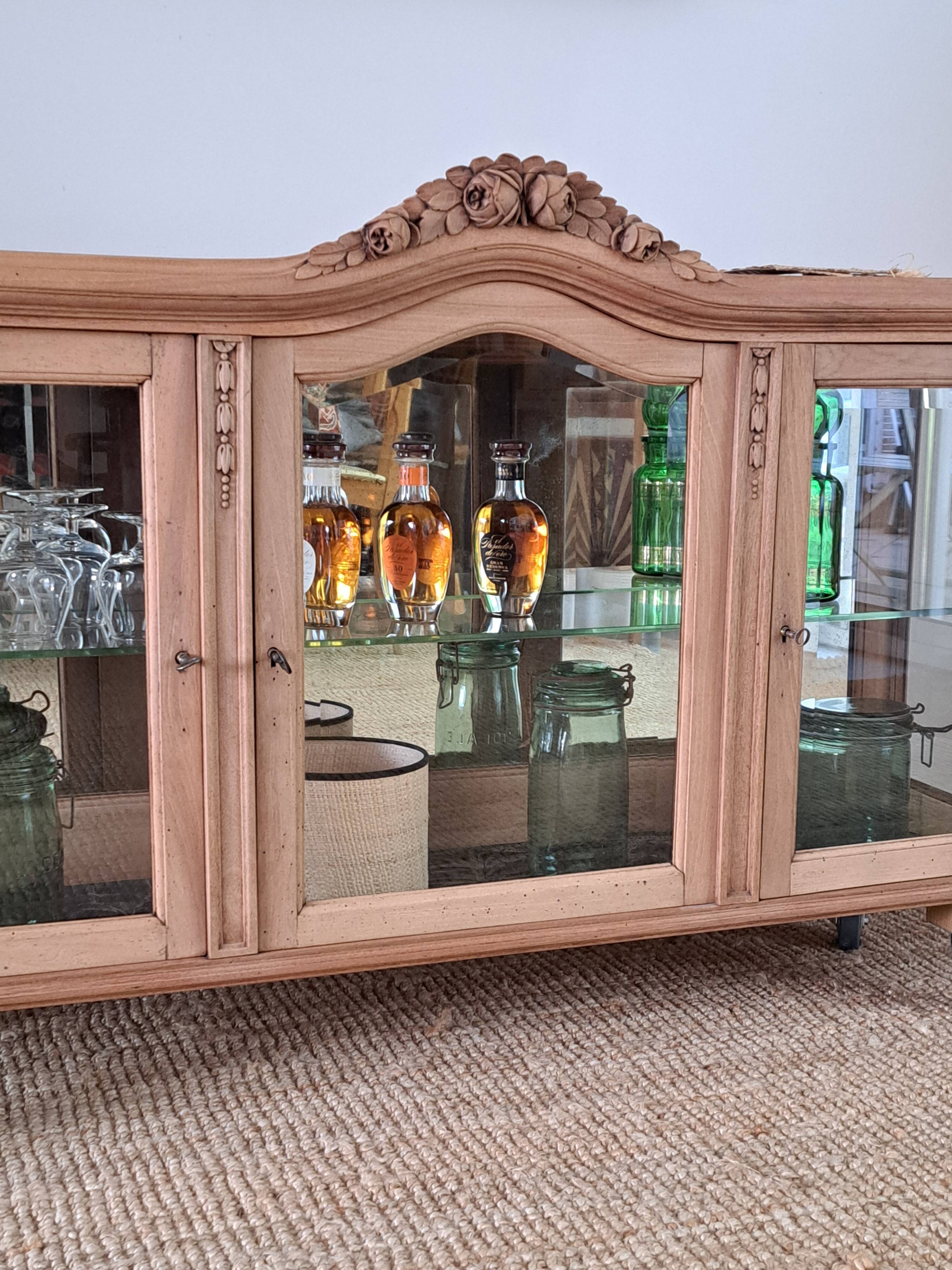 Vintage display cabinet in light wood