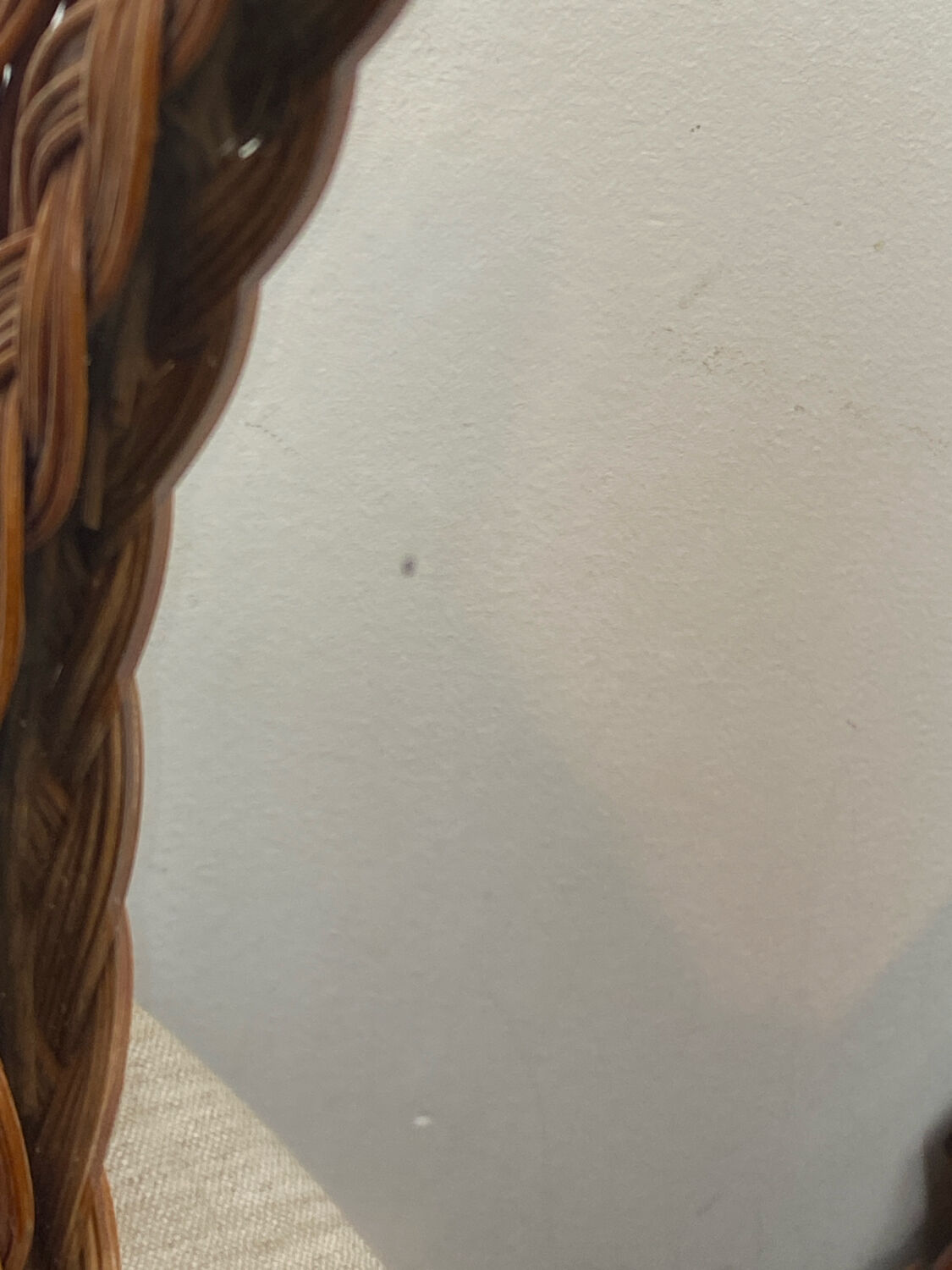 Mirror, 1970s, in woven wicker.