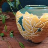 Ceramic ball vase with yellow and green leaf patterns