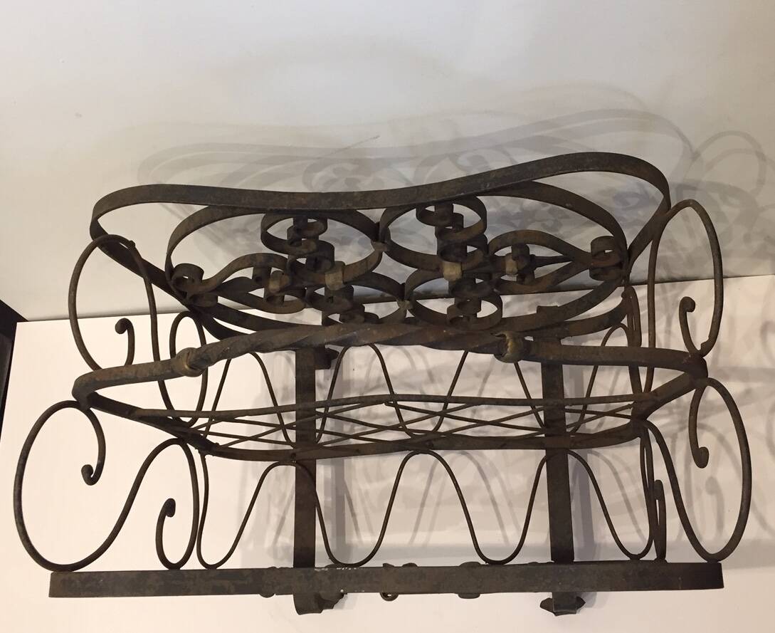wrought iron newspaper rack