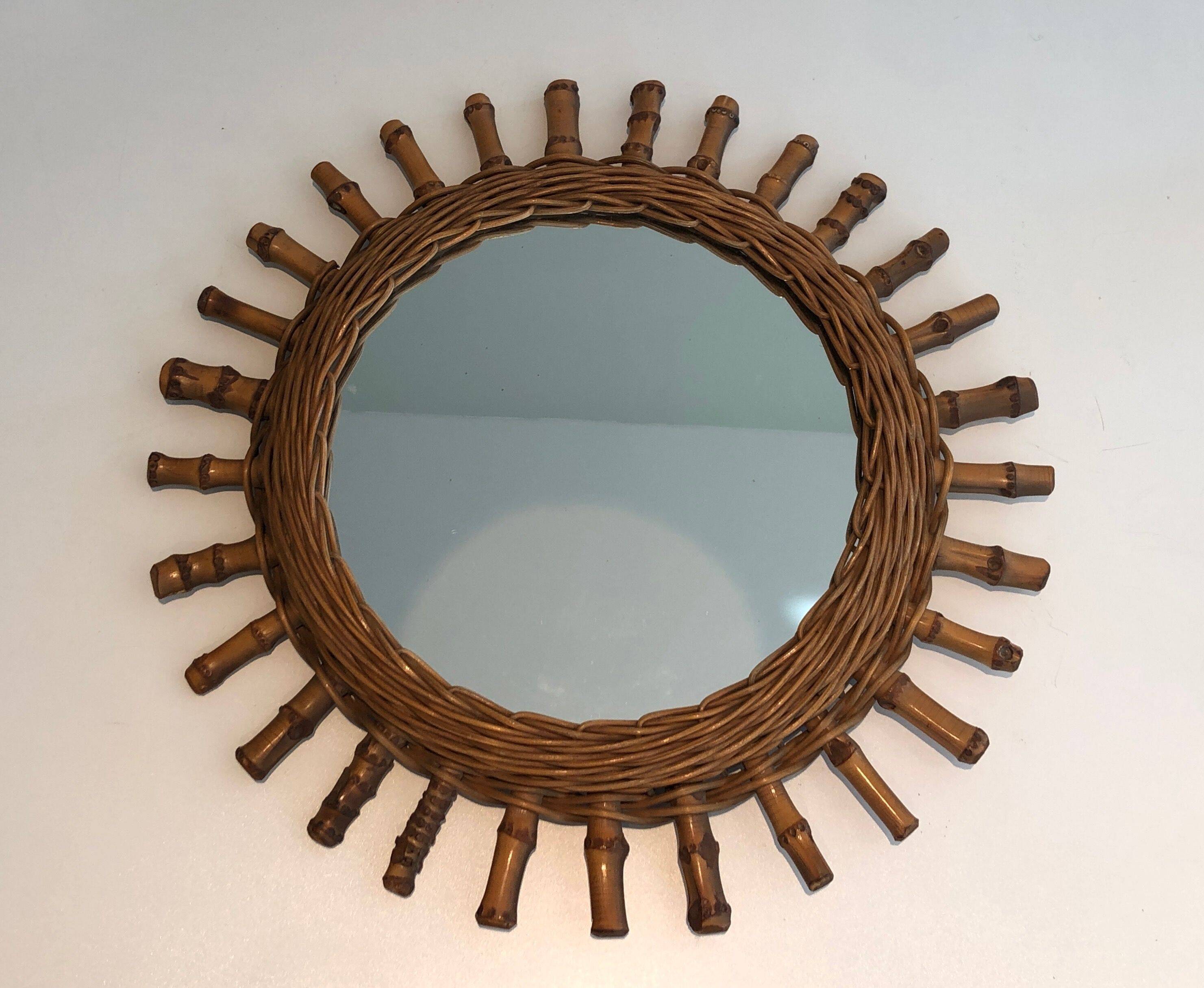 Round rattan mirror