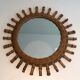 Round rattan mirror