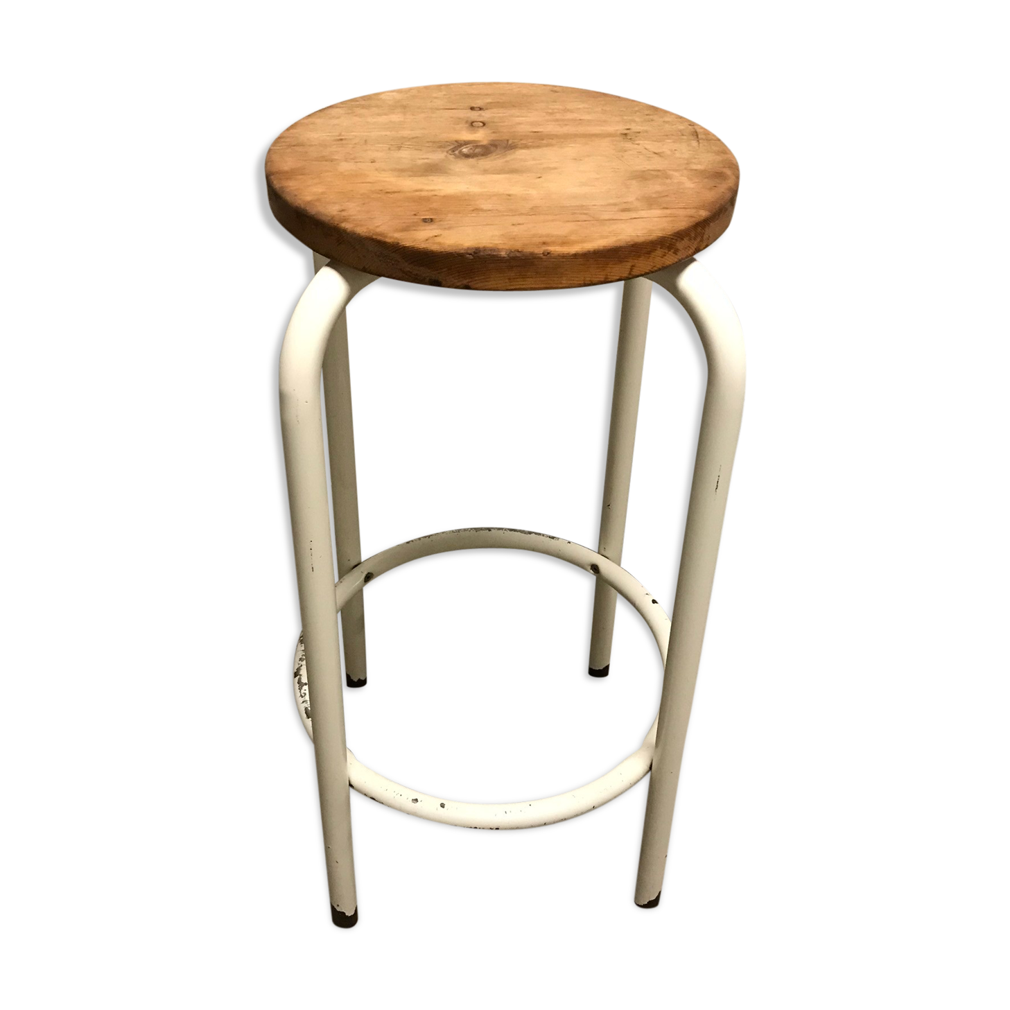 Vintage bar stool in white lace-up, round wooden seat rests circular feet